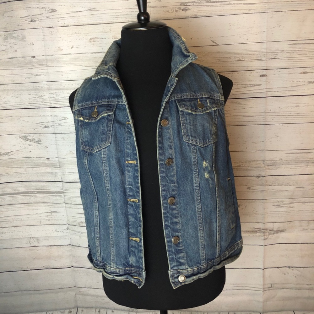 Distressed denim vest